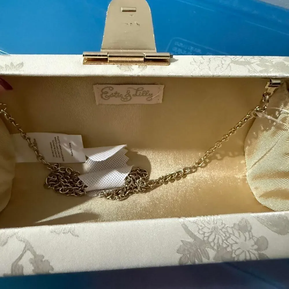Estee & Lilly cream and white floral clutch bag with gold and pearl accents